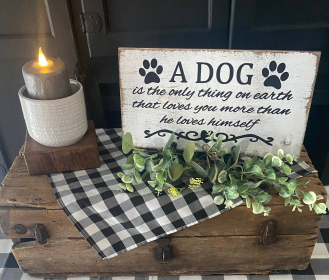A Dog Is The Only Thing On Earth That Loves You More Than He Loves Himself sign (size: 10" x 20")